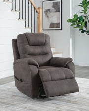 Ashley Furniture Snowfield Power Lift Recliner in a reclined position with plush upholstery and smooth lifting mechanism.