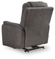 Ashley Furniture Snowfield Power Lift Recliner showing plush fabric, padded armrests, and adjustable back for comfort.