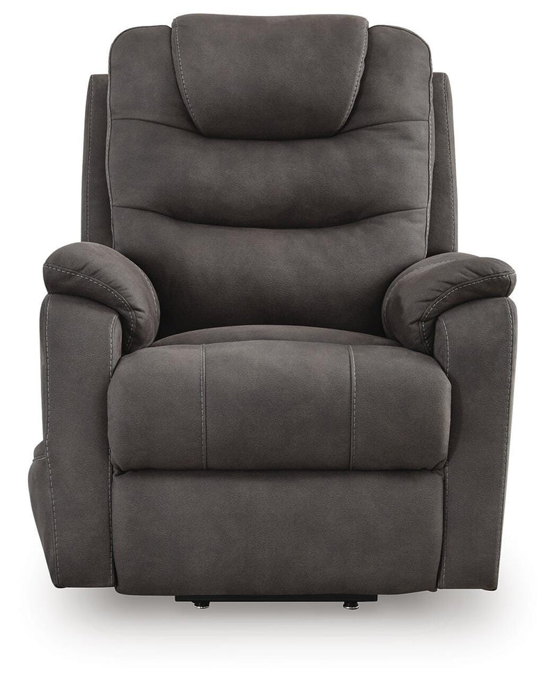 Ashley Furniture Snowfield Power Lift Recliner with plush fabric, padded armrests, and a built-in power lift mechanism.