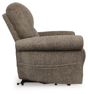 Ashley Furniture Aureta Power Lift Recliner in beige with plush upholstery and side control panel for easy adjustment.