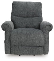 Ashley Furniture Aureta Power Lift Recliner in beige fabric with padded armrests and plush back support.