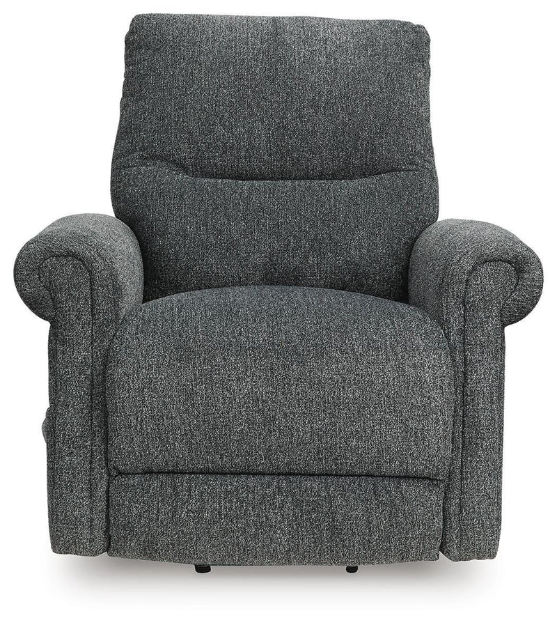 Ashley Furniture Aureta Power Lift Recliner in beige fabric with padded armrests and plush back support.