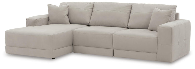 Ashley Furniture Next-Gen Gaucho sectional sofa with chaise, modern fabric upholstery and angled design in living room setting.