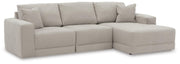 Ashley Furniture Next-Gen Gaucho sectional sofa with chaise in a modern living room, featuring plush cushions and stylish design.