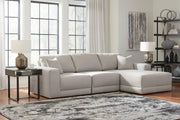 Ashley Furniture Next-Gen Gaucho sectional sofa with chaise, featuring plush cushions and modern design in a living room setting.