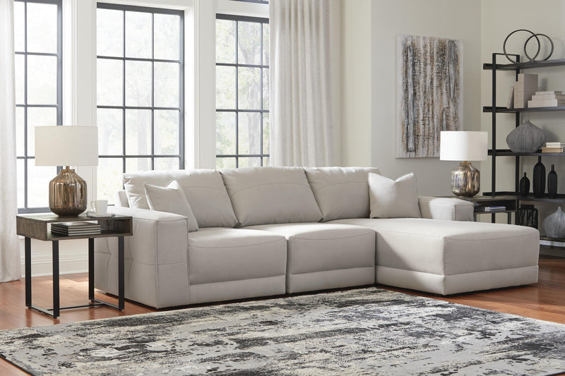 Ashley Furniture Next-Gen Gaucho sectional sofa with chaise, featuring plush cushions and modern design in a living room setting.