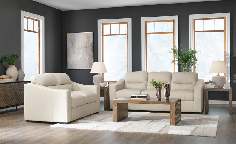 Ashley Furniture Treasure Trove living room set with plush sofa and matching armchair in a cozy, stylish living space.