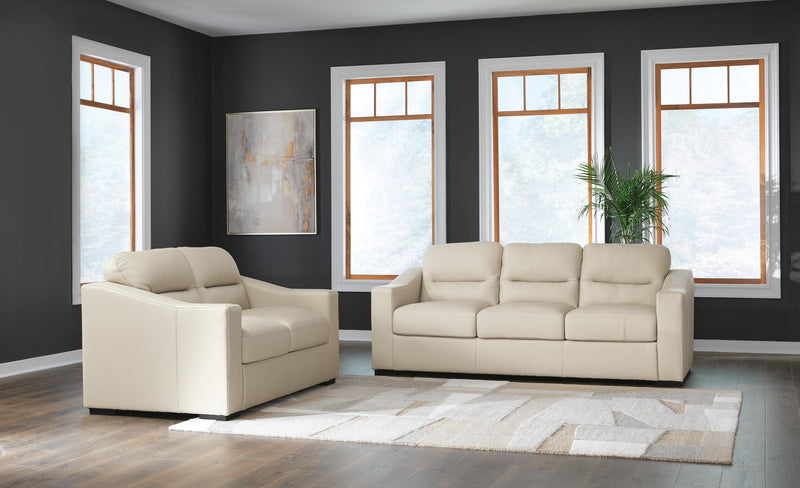 Ashley Furniture Treasure Trove living room set with sofa, armchair, and coffee table in a cozy, modern design.