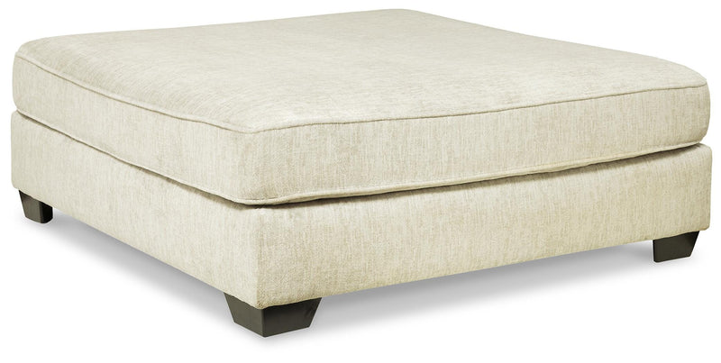 Ashley Furniture Rawcliffe living room set with sofa and loveseat in neutral upholstery, modern design, and plush cushions.