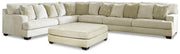 Ashley Furniture Rawcliffe living room set with sofa, loveseat, and armchair arranged in a cozy, modern design.