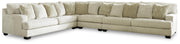 Ashley Furniture Rawcliffe living room set with sofa, loveseat, and armchair in a modern, neutral-toned fabric.