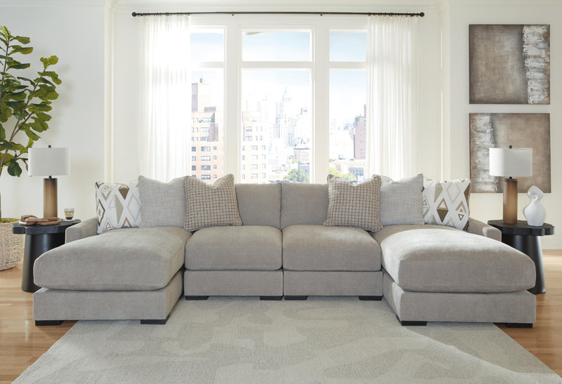 Ashley Furniture Aslan Court sectional sofa pit section with plush cushions and modern design, shown in a spacious living room setting.
