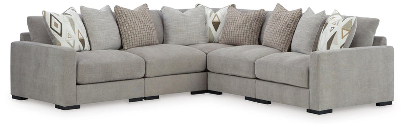 Ashley Furniture Aslan Court sectional sofa with plush cushions and neutral fabric, shown in a modern living room setting.