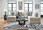 Ashley Furniture Calnita sectional with chaise, showcasing a modern upholstered sofa with a spacious seating area and plush cushions.