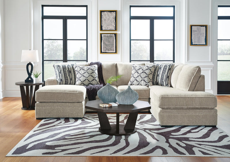 Ashley Furniture Calnita sectional with chaise, showcasing a modern upholstered sofa with a spacious seating area and plush cushions.