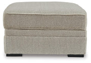 Ashley Furniture Calnita living room set featuring a sofa and loveseat with plush cushions and modern design.