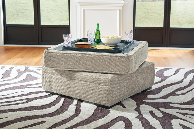 Ashley Furniture Calnita Living Room Set with sofa and armchair, featuring plush cushions and stylish design for modern living spaces.