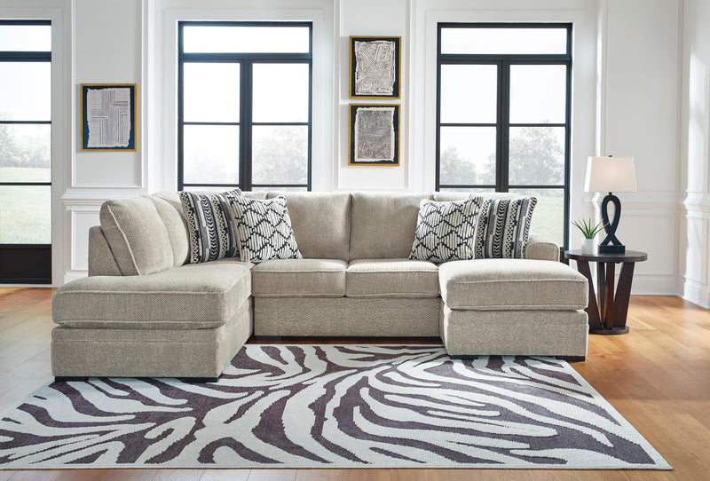 Ashley Furniture Calnita sectional with chaise, modern fabric sofa with plush cushions and chaise lounge for comfortable seating.