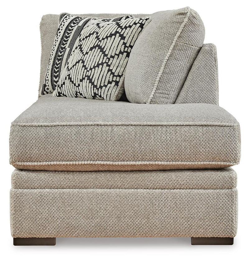 Ashley Furniture Calnita sectional with chaise, showcasing a modern fabric sofa with clean lines and plush cushions.
