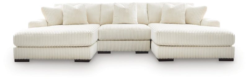 Ashley Furniture Lindyn sectional with double chaise, featuring plush fabric and modern design, viewed head-on from the front.