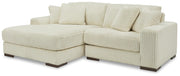 Ashley Furniture Lindyn sectional with chaise, featuring plush fabric upholstery and modern design for comfortable living space.