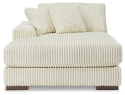 Ashley Furniture Lindyn sectional with chaise, showing plush fabric and modern design from a head-on view.