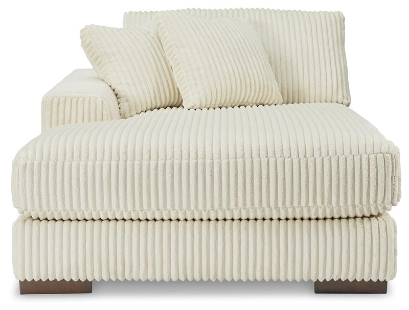 Ashley Furniture Lindyn sectional with chaise, showing plush fabric and modern design from a head-on view.