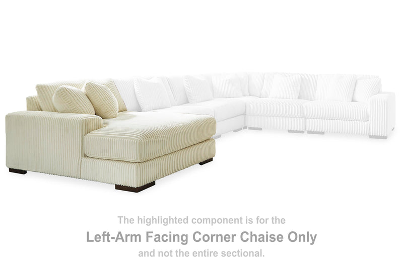 Ashley Furniture Lindyn sectional with chaise, featuring plush upholstery and modern design, shown in a stylish living room setting.