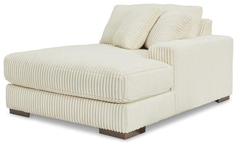 Ashley Furniture Lindyn sectional with chaise, featuring plush fabric, modern design, and multiple seating areas in an angled view.