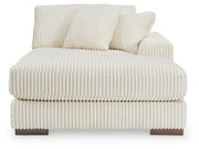 Ashley Furniture Lindyn sectional with chaise, showing plush fabric upholstery and modern design from a head-on view.