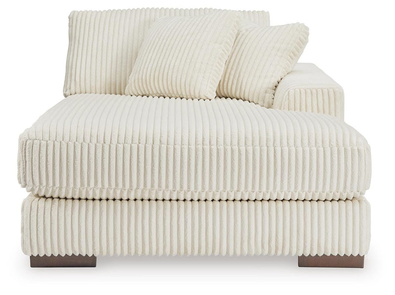 Ashley Furniture Lindyn sectional with chaise, showing plush fabric upholstery and modern design from a head-on view.