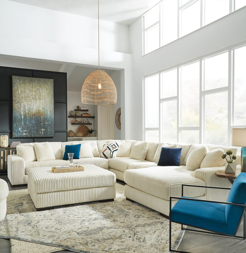 Ashley Furniture Lindyn living room set with a sofa, loveseat, and armchair in a modern living room arrangement.