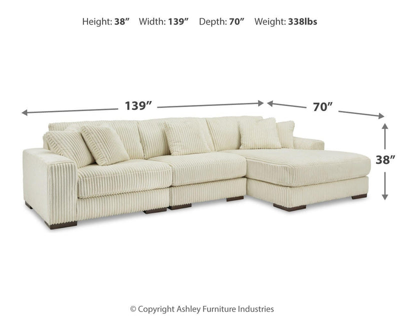 Ashley Furniture Lindyn living room set with sofa and loveseat in a cozy, modern living space.