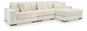 Ashley Furniture Lindyn living room set with sofa, loveseat, and matching coffee table in a modern design.