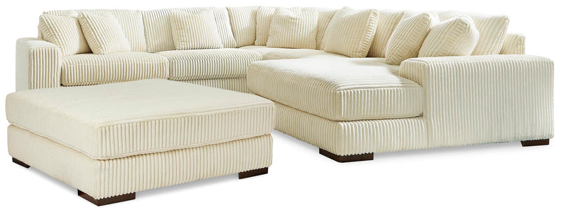 Ashley Furniture Lindyn living room set featuring a sofa and armchair with neutral fabric upholstery and modern design.