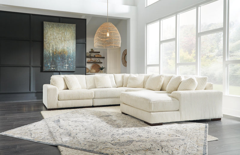 Ashley Furniture Lindyn living room set featuring a sofa and matching chairs in a modern design.