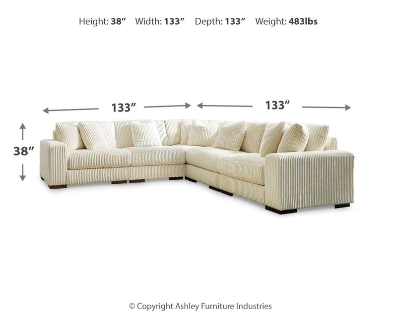 Ashley Furniture Lindyn living room set featuring a sofa and loveseat with plush cushions and modern design in a cozy living space.