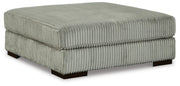 Ashley Furniture Lindyn living room set featuring a sofa and loveseat with neutral upholstery and modern design.