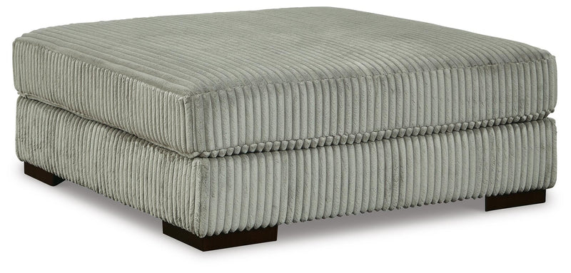 Ashley Furniture Lindyn living room set featuring a sofa and loveseat with neutral upholstery and modern design.