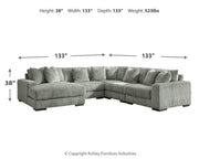 Ashley Furniture Lindyn living room set with a sofa and armchair featuring neutral upholstery and modern design.