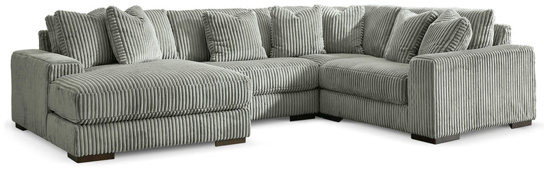 Ashley Furniture Lindyn sectional with chaise, featuring plush upholstery and modern design for comfortable living space.