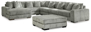 Ashley Furniture Lindyn living room set with sofa, loveseat, and armchair in neutral fabric and modern design.