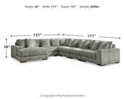 Ashley Furniture Lindyn living room set with sofa and armchair in a modern, stylish design, featuring neutral upholstery.