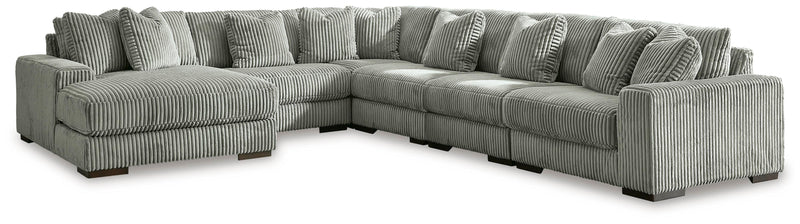 Ashley Furniture Lindyn living room set with a sofa and loveseat, featuring plush cushions and modern design.
