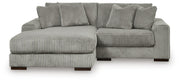 Ashley Furniture Lindyn sectional with chaise, showing a contemporary fabric sofa with plush cushions and a spacious design.