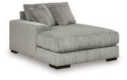 Ashley Furniture Lindyn sectional with double chaise, showcasing plush fabric, modern design, and multiple seating options.