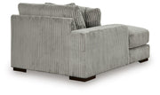 Ashley Furniture Lindyn sectional with chaise, showing plush fabric upholstery and modern design in a spacious living room setting.