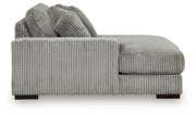 Ashley Furniture Lindyn sectional with double chaise, featuring plush cushions and modern design, shown in a stylish living room setting.