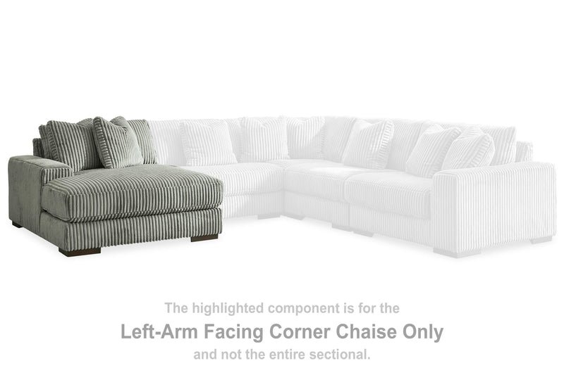 Ashley Furniture Lindyn sectional with chaise, featuring plush upholstery and modern design, shown in a living room setting.