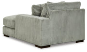 Ashley Furniture Lindyn sectional with chaise, showing plush fabric, modern design, and comfortable seating arrangement.
